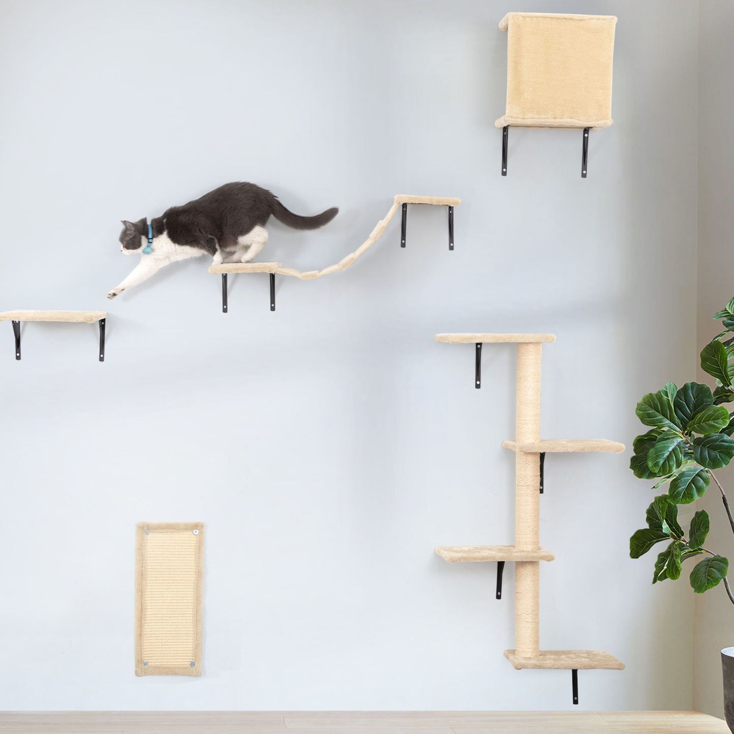 Wall-mounted cat climbing shelves and sisal post create a vertical path across a soft gray wall. A black and white cat strides mid-leap along the platforms, showing the set’s scale, grace, and enrichment in a bright, modern room.