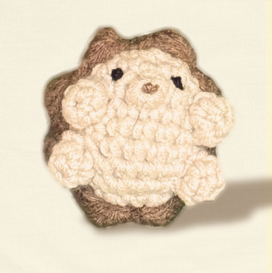 Harold the Hedgehog, a handmade catnip toy from Feline Grove’s Chunkle Puff collection, shown alone on a neutral background. Woven round hedgehog form highlights luxury craftsmanship and woodland charm.