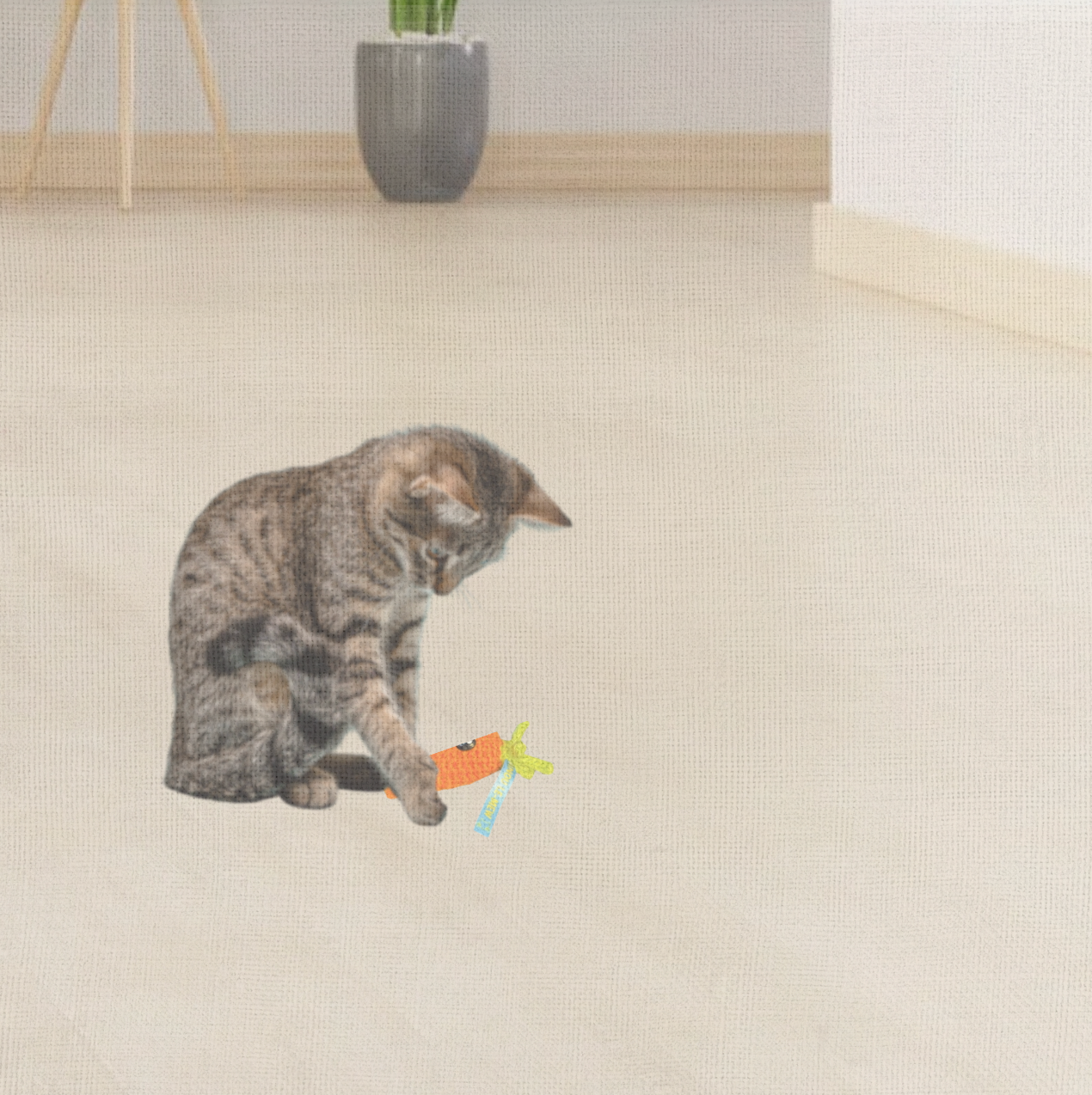 Cat playing with Lulu the Carrot, a handmade Chunkle Puff catnip toy from Feline Grove. The 3.5-inch woven carrot is batted and carried, demonstrating playful harvest charm and irresistible Miracle Nip botanicals.