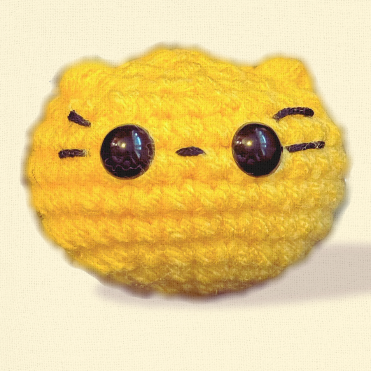 Pippa the Chonk, a handmade weighted Chunkle Chunk catnip toy by Feline Grove, shown alone on a neutral background. Round plush form highlights luxury craftsmanship, botanical fill, and collectible charm.