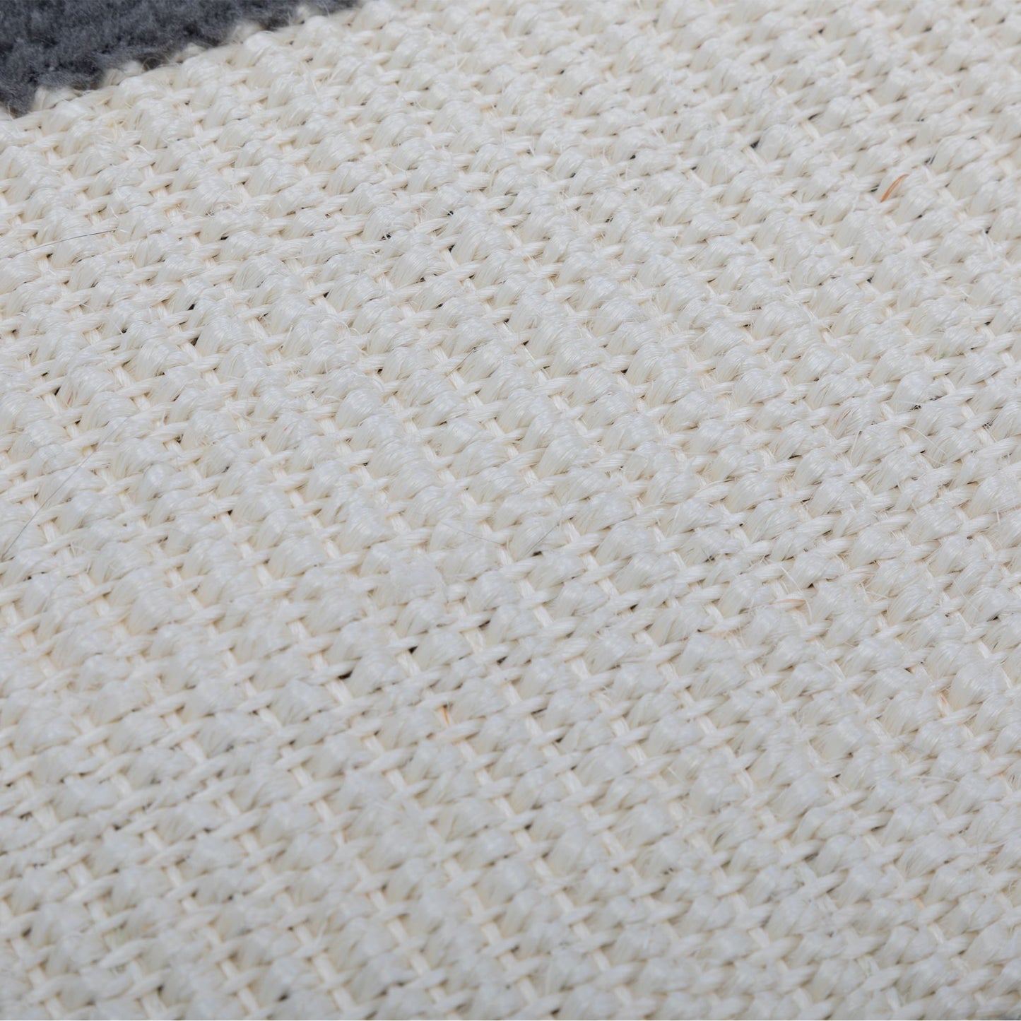Close-up of the tightly woven natural sisal fabric on The Grove Set’s wall-mounted scratcher, bordered with soft grey plush for a refined, functional detail that invites daily use.