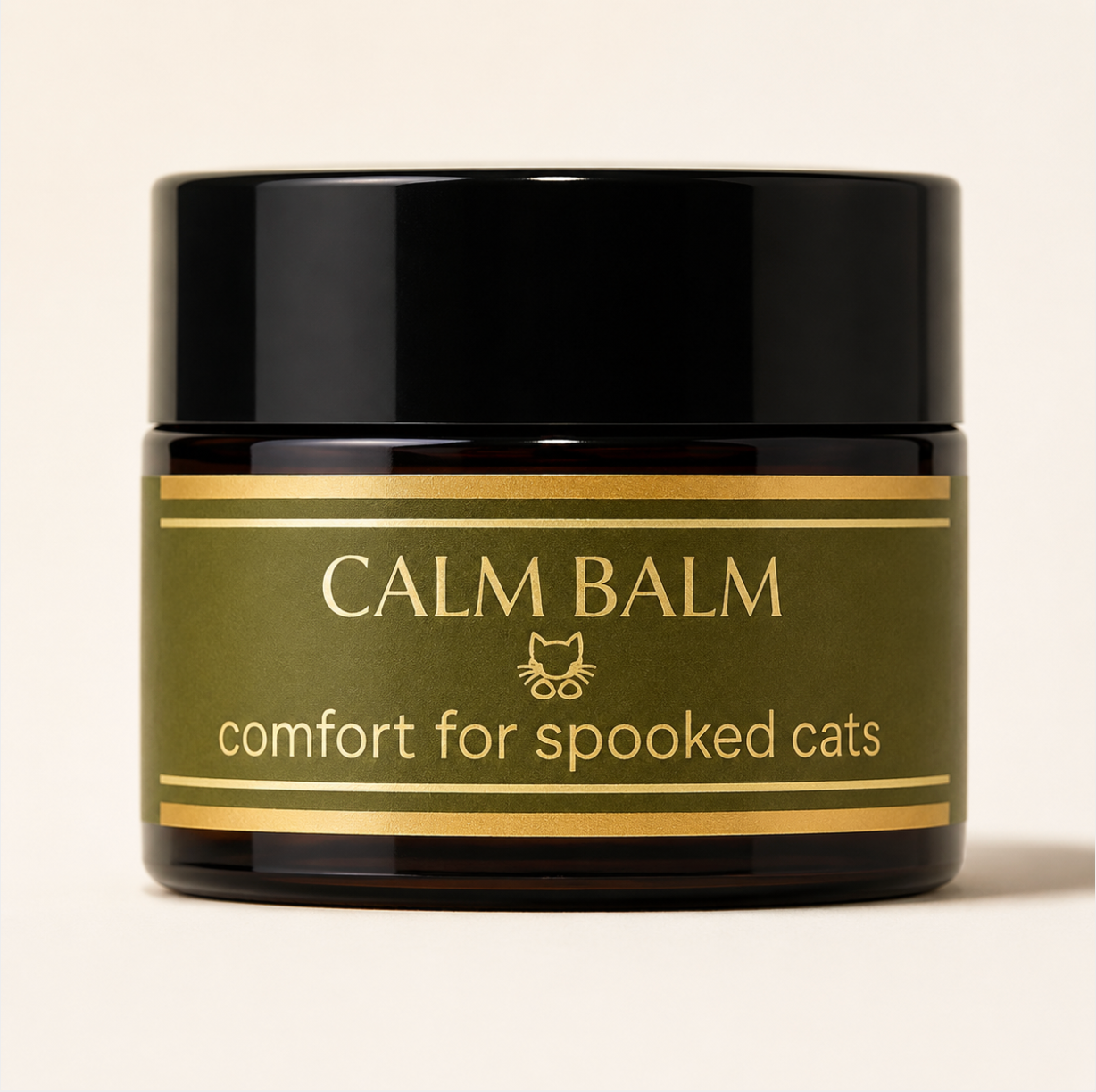 Amber jar of Calm Balm with black lid and olive label, centered on a warm ivory surface with soft shadowing and clear gold lettering.