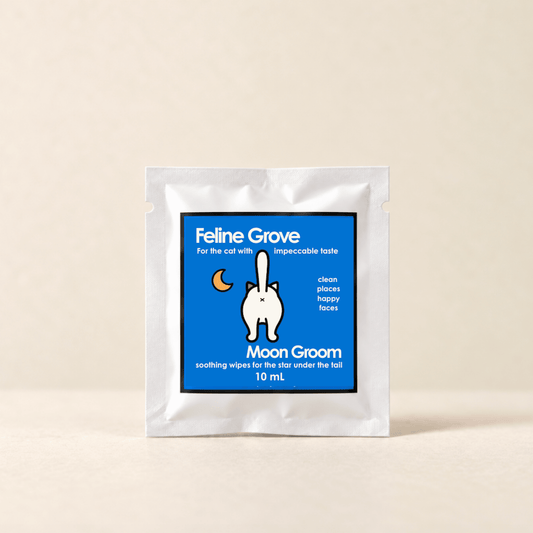 Soothing Kitty Cat Butt Wipes - Moon Groom 1 - hero image - cartoon cat with tail in air on a single packette containing moon groom solution and one wipe