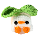 Small crocheted Chunkle Puff cat toy shaped like a white chick in a peach suit with green head and orange beak,.